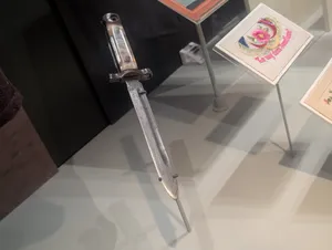 A dagger with a slit through which blood can run after stabbing a person to enable a person to more effectively bleed out without having to remove the knife.