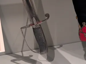 The crossbar and handguard of a sabre.